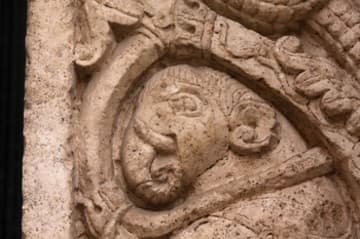 Elephant among vines on the jamb of the west portal.