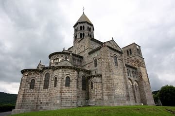 Exterior view from northeast, 12th century. Saint-Nectaire Church, Auvergne, France.