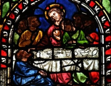 13th-century stained glass depicting The Last Supper.