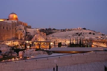 View from the Dung Gate across to Mount of Olives, with Al-Aqsa illuminated on the left.