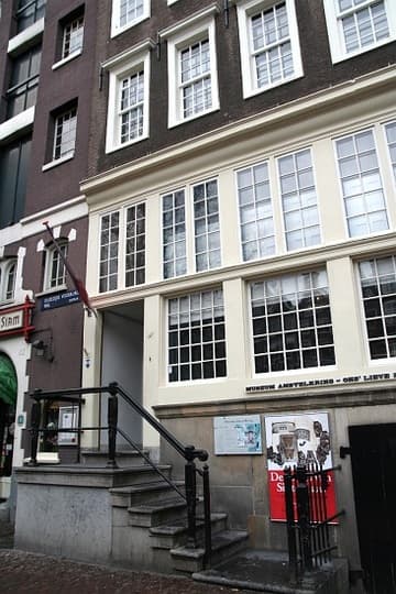 Facade and entrance to the Museum Amstelkring (Ons' Lieve Heer op Solder, "Our Lord in the Attic"), built 1661 inside a private house. Amsterdam, The Netherlands.
