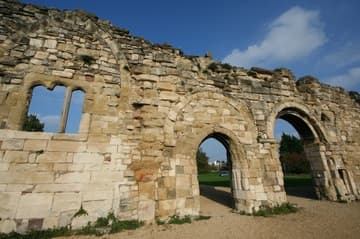 Large pointed arch of 1250 (left) and smaller rounded arches of 1152. Related pages: