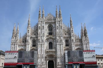 Gothic west facade of Milan Cathedral, begun in 1386.