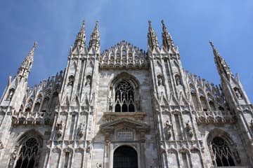 Gothic west facade of Milan Cathedral, begun in 1386.