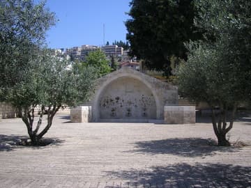 Mary's Well, in a photo taken a few years ago before restorations to the structure. The upper structure is modern and the site still functions as a public fountain. Public domain photo. Related pages: