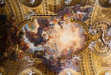 Baroque fresco of The Triumph of the Holy Name of Jesus on the ceiling of the nave by Giovanni Battista Gaulli, known as Baciccia, 1661-79. Il Gesu, the mother church of the Jesuits, 16th century. Rome, Italy.