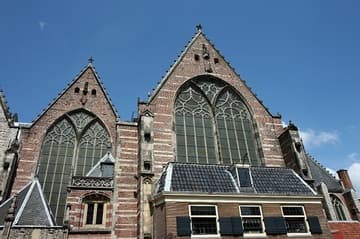 Exterior of transept (right, c.1390) and a chapel (c.1550) of the Oude Kerk, Amsterdam, Netherlands.