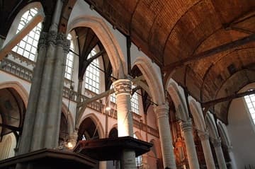 View southwest to the nave from the north aisle (c.1390). Oude Kerk, Amsterdam, Netherlands.
