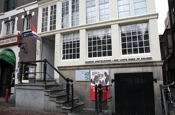 Facade and entrance to the Museum Amstelkring (Ons' Lieve Heer op Solder, "Our Lord in the Attic"), built 1661 inside a private house. Amsterdam, The Netherlands.