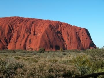 Uluru just after sunrise.