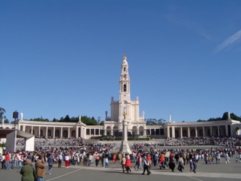 Pilgrims gather in the central plaza at the Shrine of Fatima.