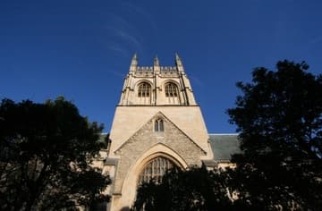 The 14th-century chapel tower from the west, where a nave was once planned but never built. Founded in 1264, Merton College is the oldest college in Oxford.