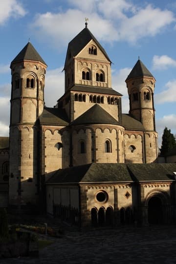 The magnificent Romanesque west facade at sunset.