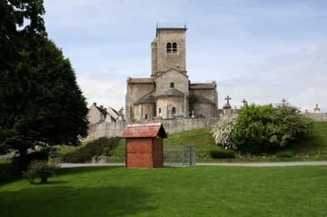 View of chevet and tower from below the church, 12th century.