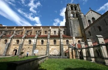 Exterior view of the long Romanesque nave (1120-32) from the south.