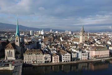 View of the Fraumünster (and St Peterskirche) from the tower of the Grossmünster.