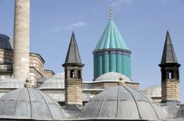 Towers and Green Dome of the shrine/museum.