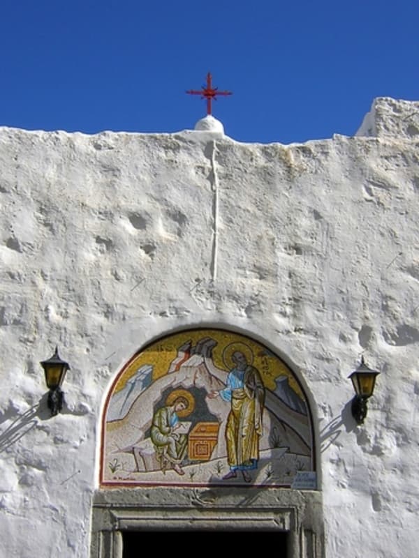 A mosaic over the entrance to the Cave of the Apocalypse depicts the revelation received by John.