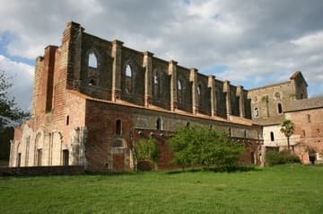 View of abbey church from southwest. San Galgano Abbey, built by the Cistercians 1224-88. Tuscany, Italy.