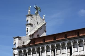 Back of the west facade with open stairway, viewed from south.