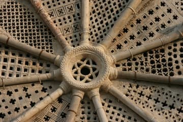 Detail of the beautiful rose window on the west facade of Troia Cathedral, dating from 1160-80 and filled with stone screens of Islamic-inspired geometrical designs.